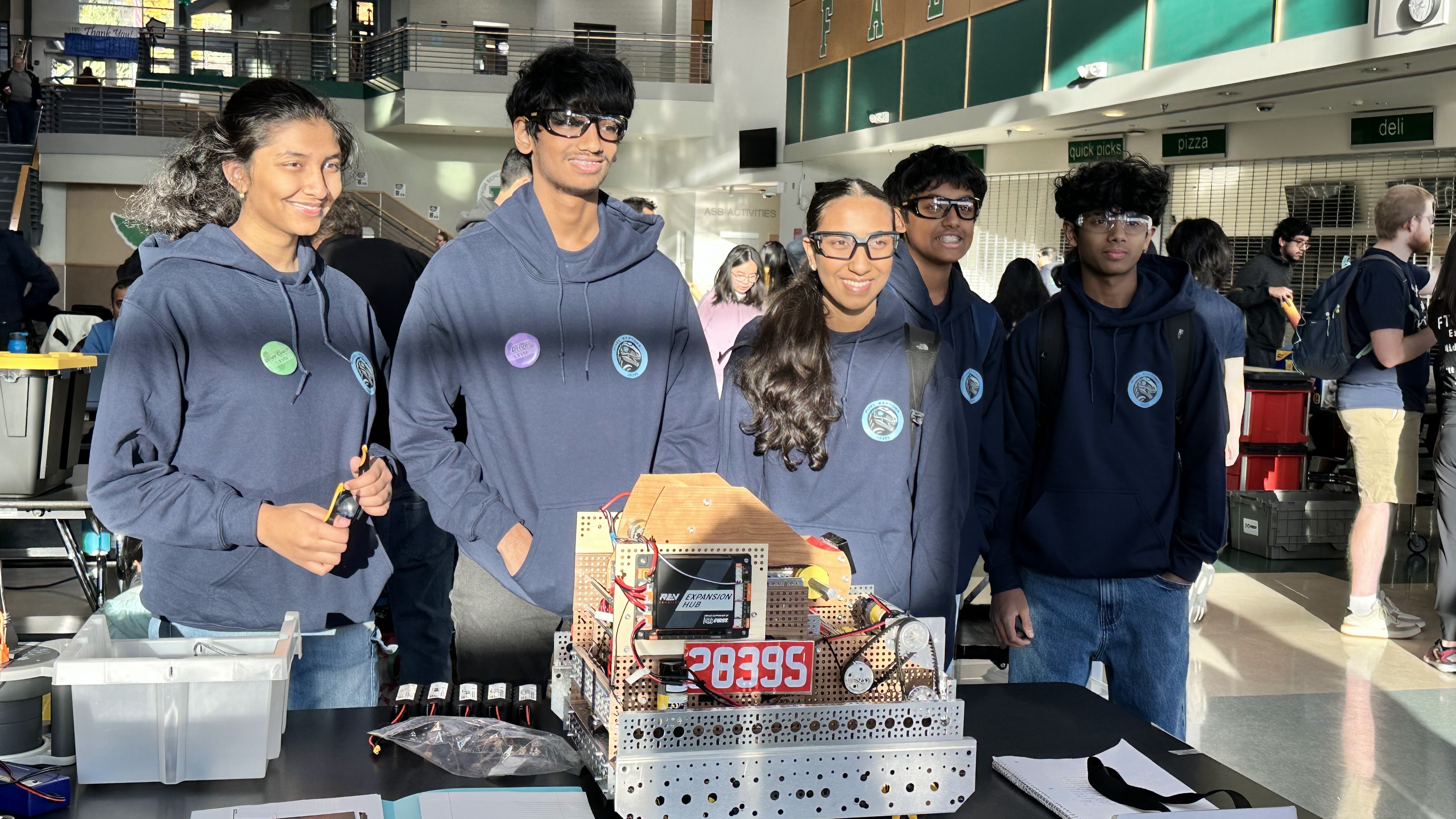Team members testing the robot